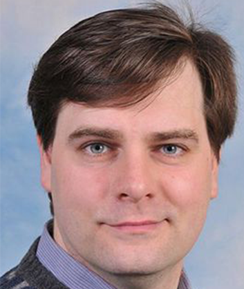 Dr. Denis Larkin
