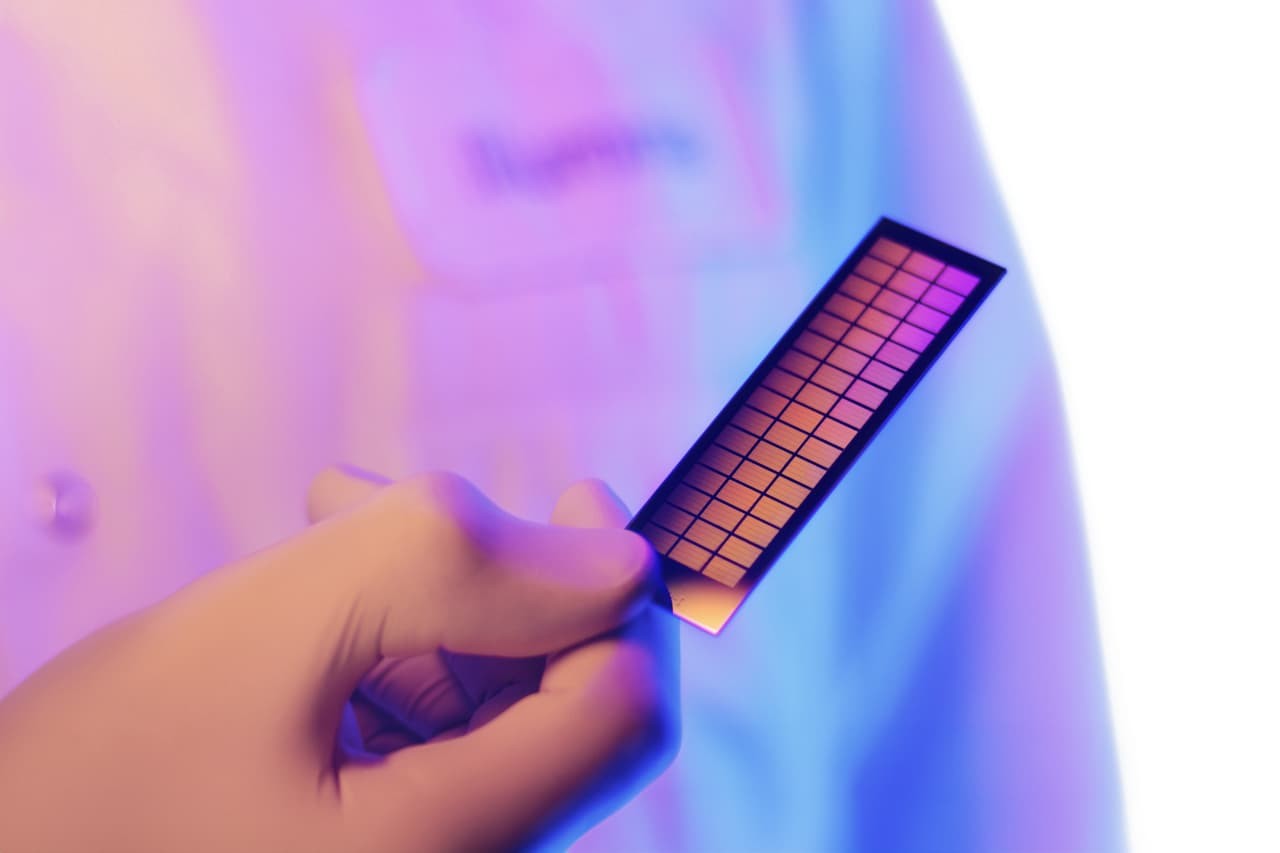 Scientist holding beadchip